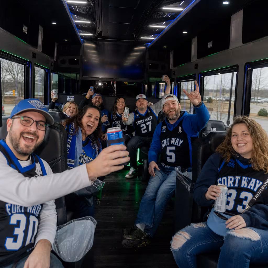 Group boarding a white charter bus for Sporting Event Transportation transportation in San Francisco